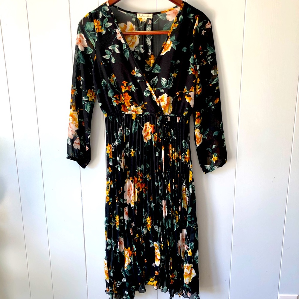 Adorable flirty dress with a V neckline. You’ll be date night ready!